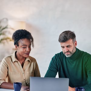 two-diverse-people-working-in-the-office-2024-10-15-01-56-36-utc-1