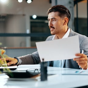 young-arab-businessman-working-at-the-table-in-mod-2025-02-24-18-15-52-utc-1